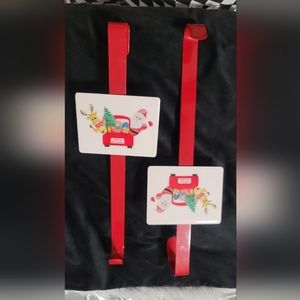 I'm selling two beautiful Christmas wreath hangers.